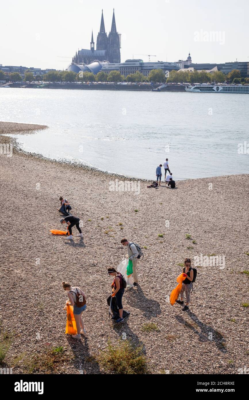 on the International Rhine CleanUp Day on September 12, 2020 volunteers collect garbage along the banks of the Rhine. In Cologne the association K.R.A Stock Photo