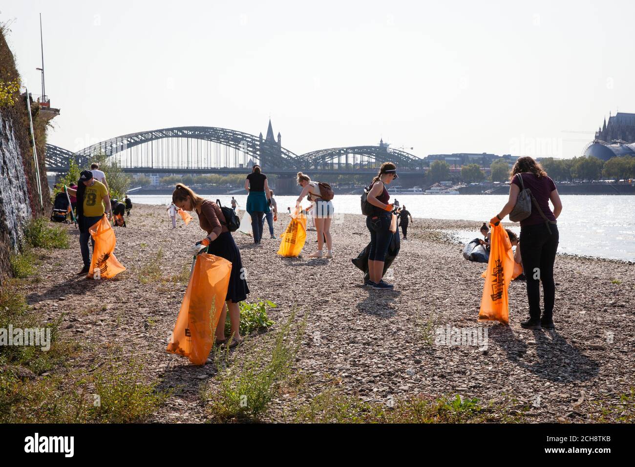 on the International Rhine CleanUp Day on September 12, 2020 volunteers collect garbage along the banks of the Rhine. In Cologne the association K.R.A Stock Photo