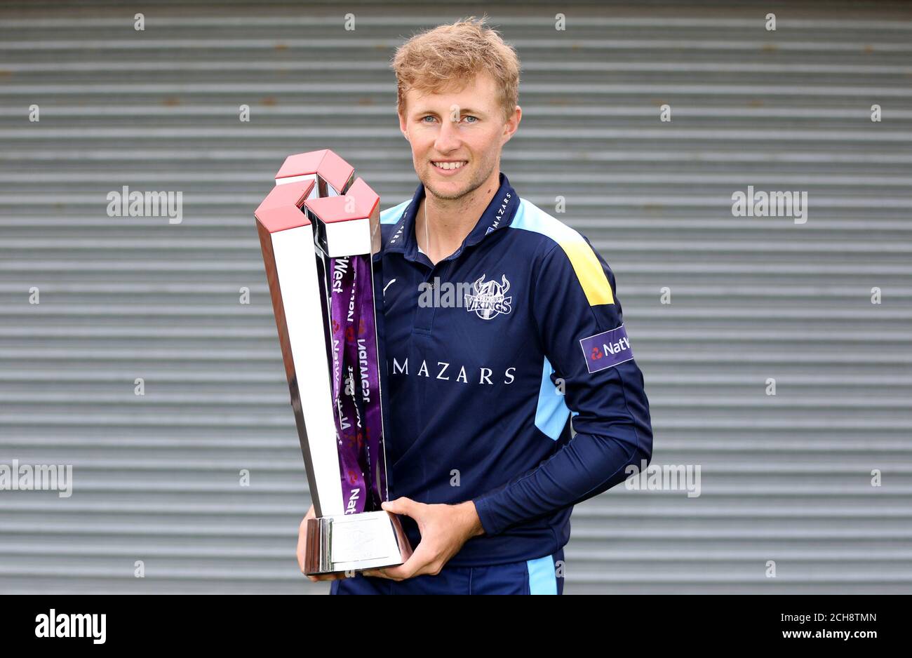 Joe Root poses with the Natwest T20 blast trophy during the T20 Blast Launch at Loughborough University, Louoghborough. PRESS ASSOCIATION Photo. Picture date: Friday May 13, 2016. See PA story cricket T20. Photo credit should read: Simon Cooper/PA Wire. RESTRICTIONS: Editorial use only. No commercial use without prior written consent of the ECB. Still image use only. No moving images to emulate broadcast. No removing or obscuring of sponsor logos. Call +44 (0)1158 447447 for further information. Stock Photo