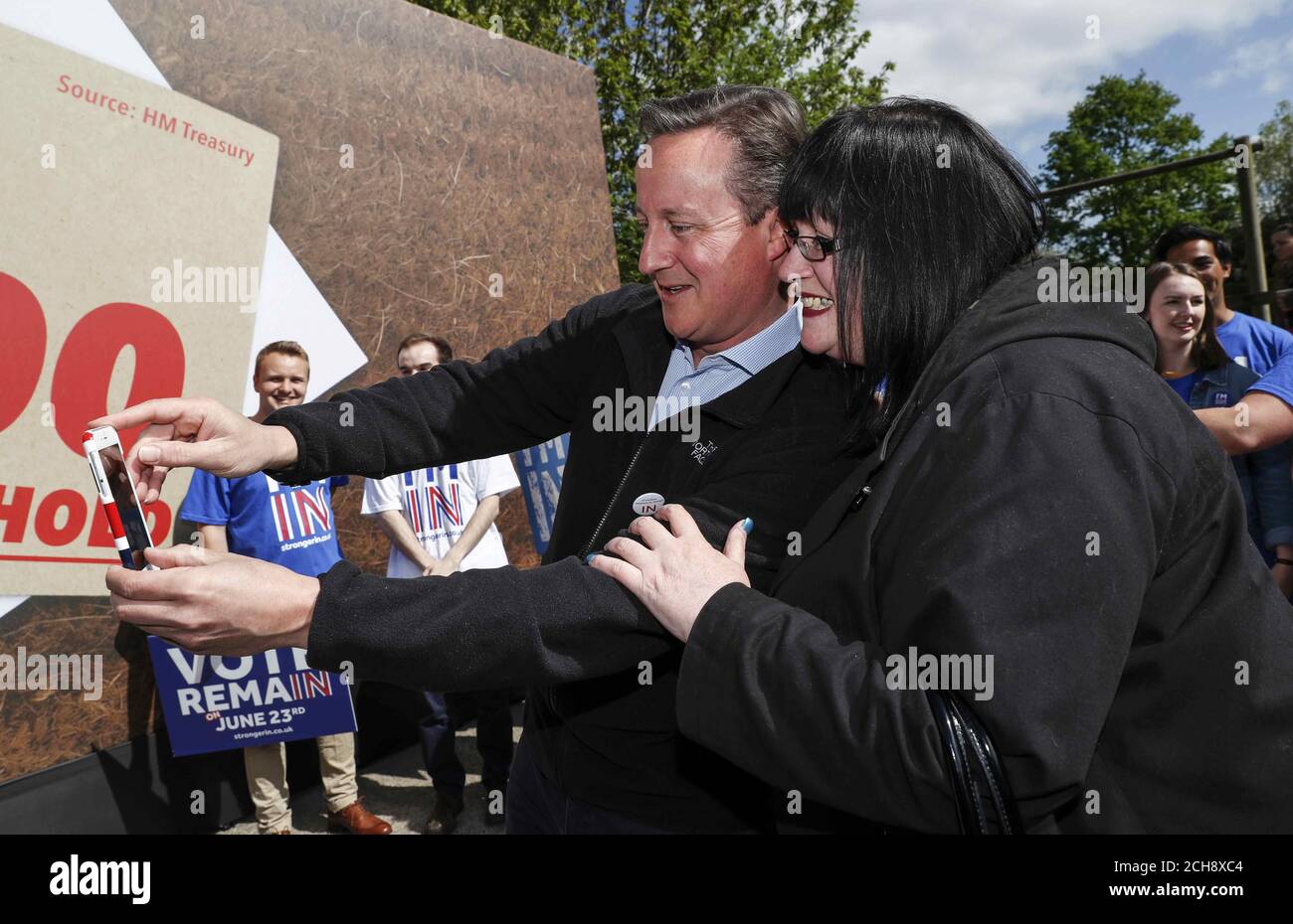 Prime Minister David Cameron poses for a selfie with a supporter at a Remain campaign event in his Witney constituency in Oxfordshire, where he warned that a vote to leave the European Union could tip the British economy back into recession. Stock Photo