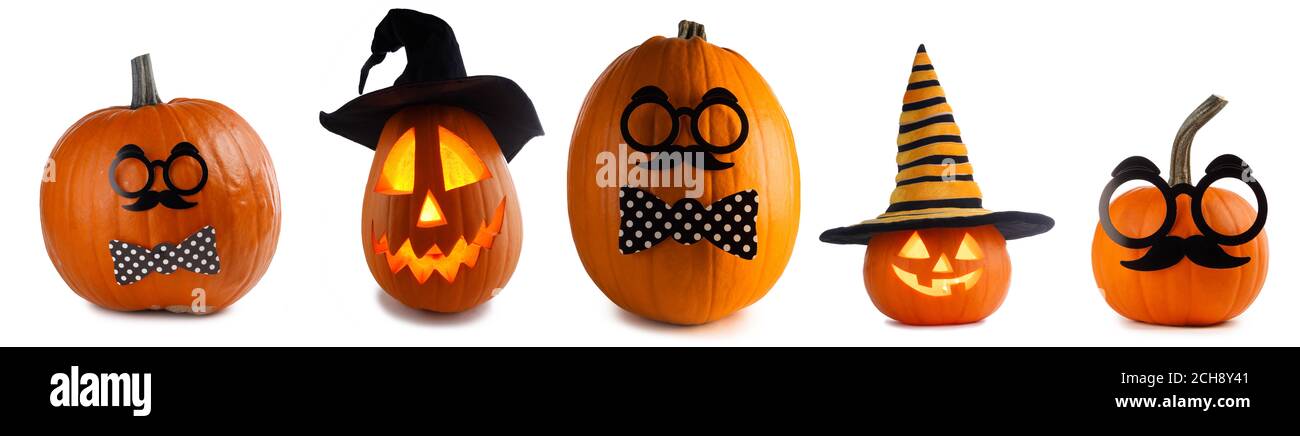 A collection of Jack O Lantern Halloween pumpkins with various ...