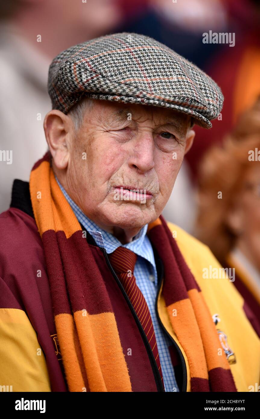 A Bradford City fan awaits the start of the match before the Sky Bet League One play off, first leg match at Valley Parade, Bradford. PRESS ASSOCIATION Photo. Picture date: Sunday May 15, 2016. See PA story SOCCER Bradford. Photo credit should read: Jon Buckle/PA Wire. RESTRICTIONS: EDITORIAL USE ONLY No use with unauthorised audio, video, data, fixture lists, club/league logos or 'live' services. Online in-match use limited to 75 images, no video emulation. No use in betting, games or single club/league/player publications. Stock Photo