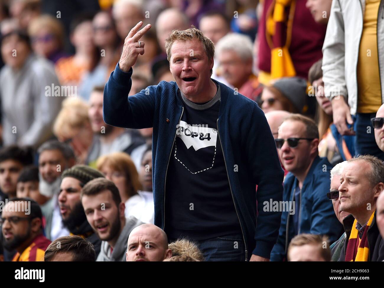 ** EDITORS NOTE GESTURE ** A Bradford City fan shows his frustration in the stands during the Sky Bet League One play off, first leg match at Valley Parade, Bradford. Stock Photo