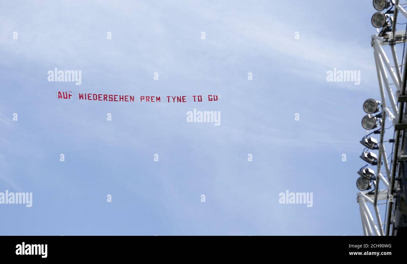 Sunderland fans hire a plane to fly over St James' Park with a banner reading 'Auf Wiedersehen Prem Tyne To Go' during the Barclays Premier League match between Newcastle United and Tottenham Hotspur. Stock Photo