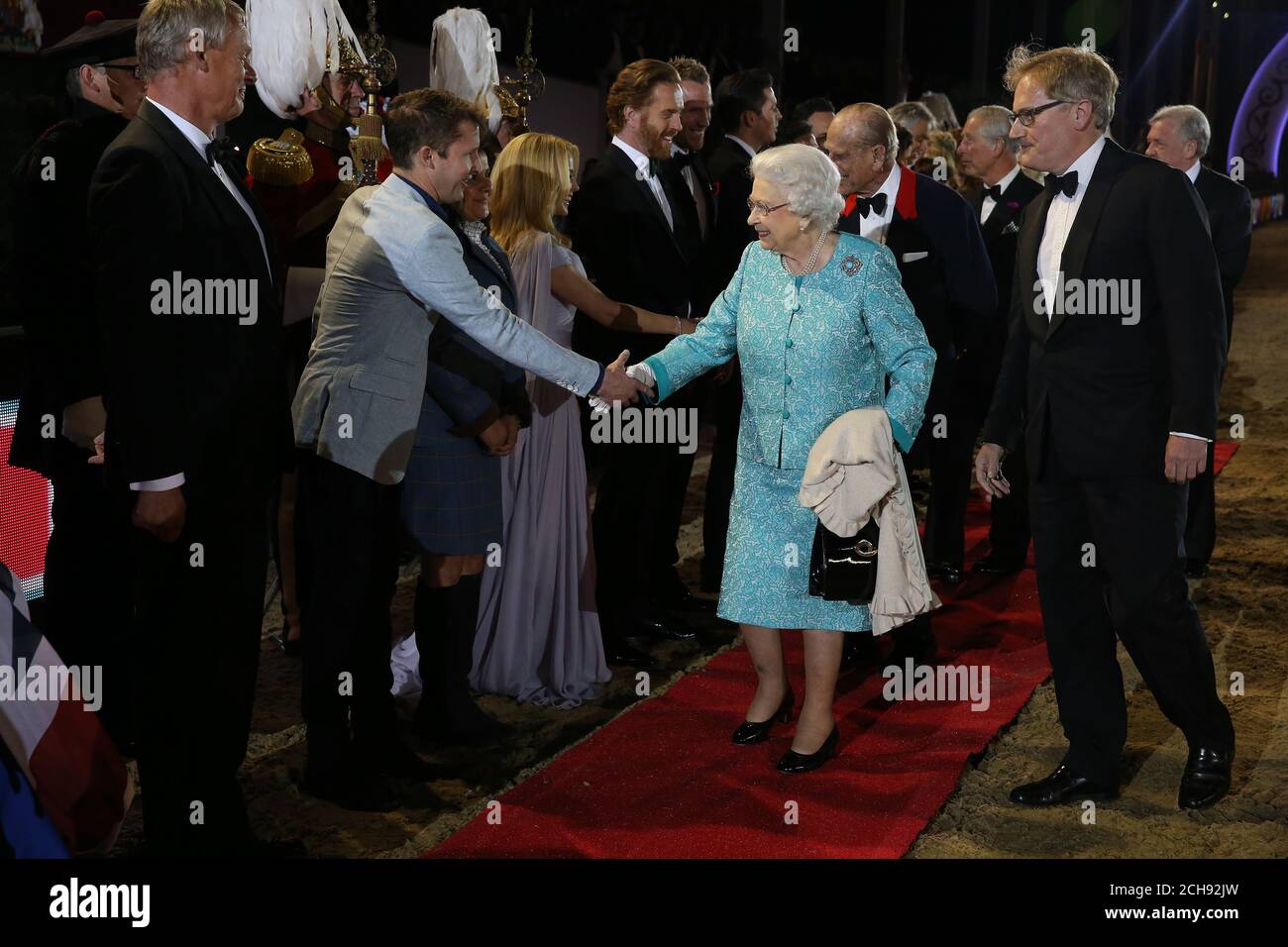 Queen Elizabeth II greets James Blunt during the televised celebration of her 90th birthday in the grounds of Windsor Castle in Berkshire. Stock Photo