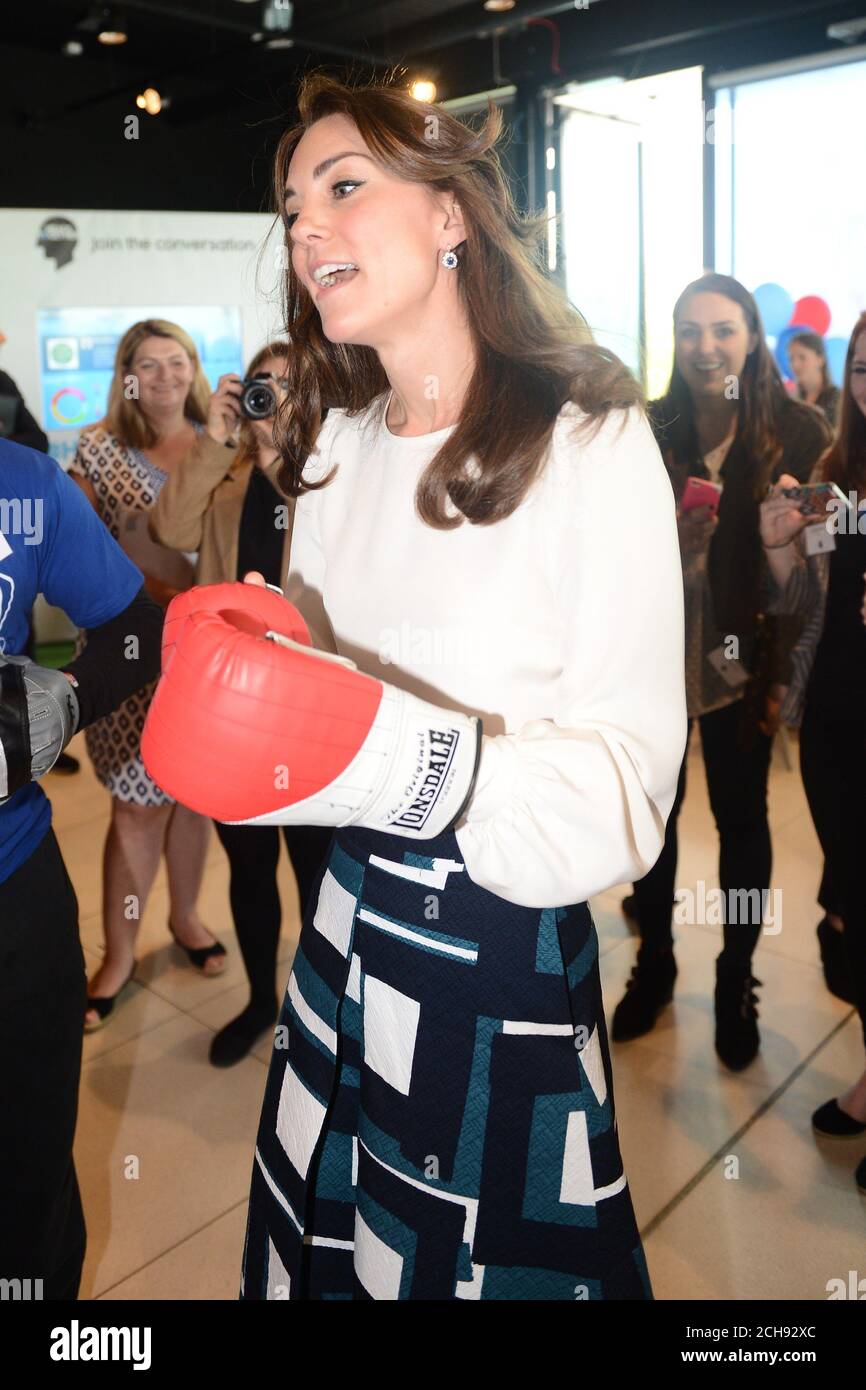 The Duchess of Cambridge spars with former boxer Duke McKenzie (not pictured) at the Queen Elizabeth Olympic Park in east London, as she launches Heads Together with the Duke of Cambridge and Prince Harry - their new campaign to end mental health stigma. Stock Photo