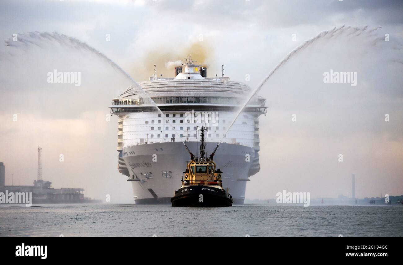 The world's largest passenger ship, MS Harmony of the Seas, owned by Royal Caribbean, docks on arrival in Southampton ahead of her maiden cruise. Stock Photo