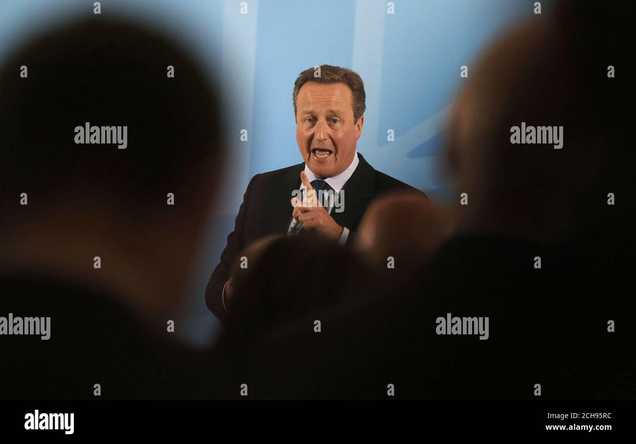 Prime Minister David Cameron addresses members of a World Economic Forum at the Mansion House in London, during which he dismissed claims by the Leave camp that quitting would lead to a bonfire of regulations as 'very, very weak' and insisted three million jobs were linked to membership. Stock Photo