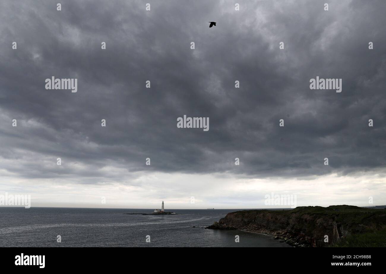 The storm clouds arrive at Whitley Bay today as the weather takes a change with heavy rain forecast in some parts of the UK. Stock Photo