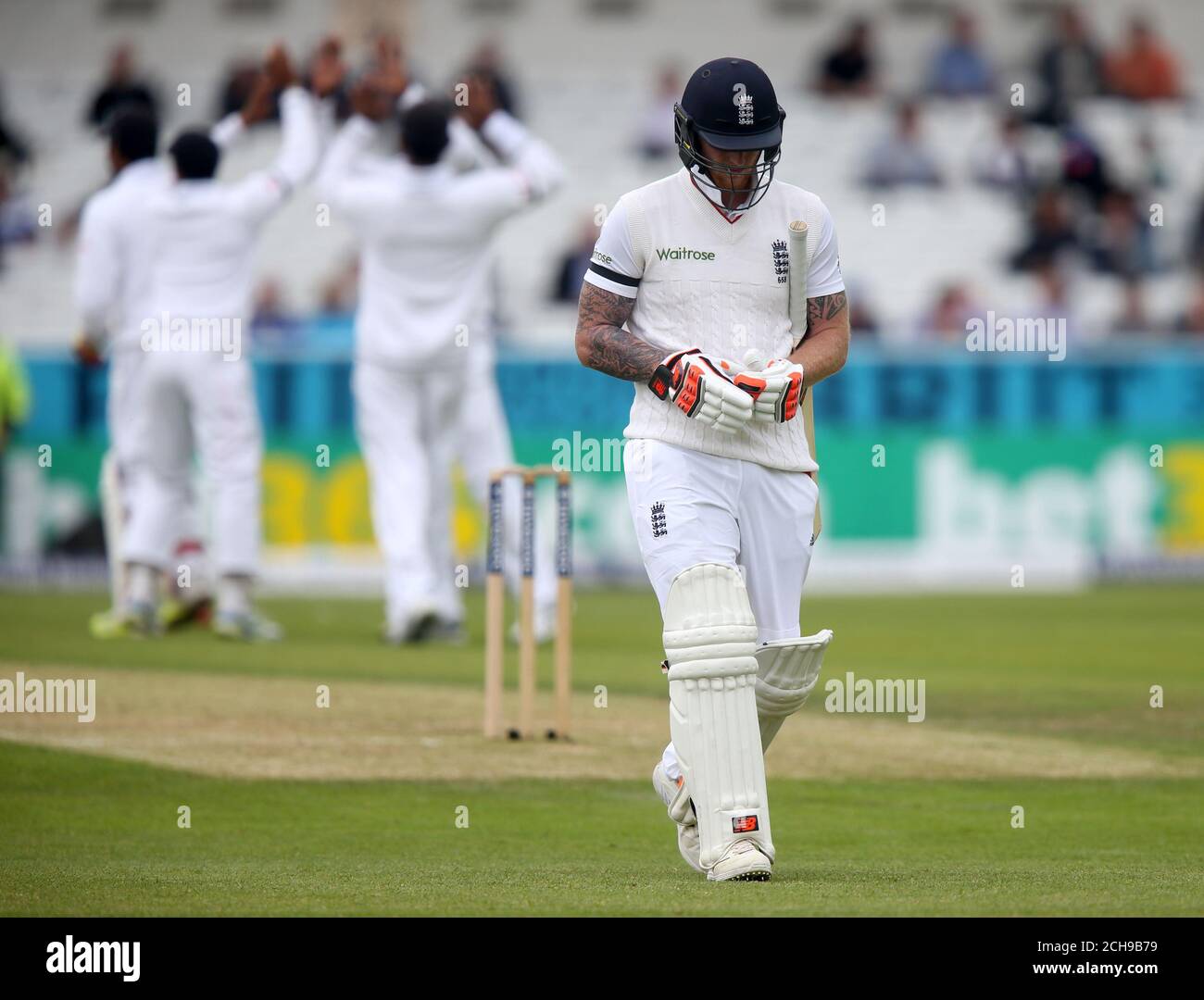 England's Ben Stokes walks off after being dismissed during day one of the 1st Investec Test at Headingley, Leeds. Stock Photo