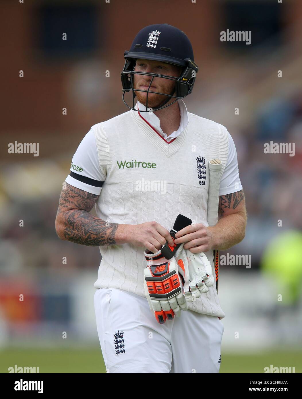 England's Ben Stokes walks off after being dismissed during day one of the 1st Investec Test at Headingley, Leeds. Stock Photo