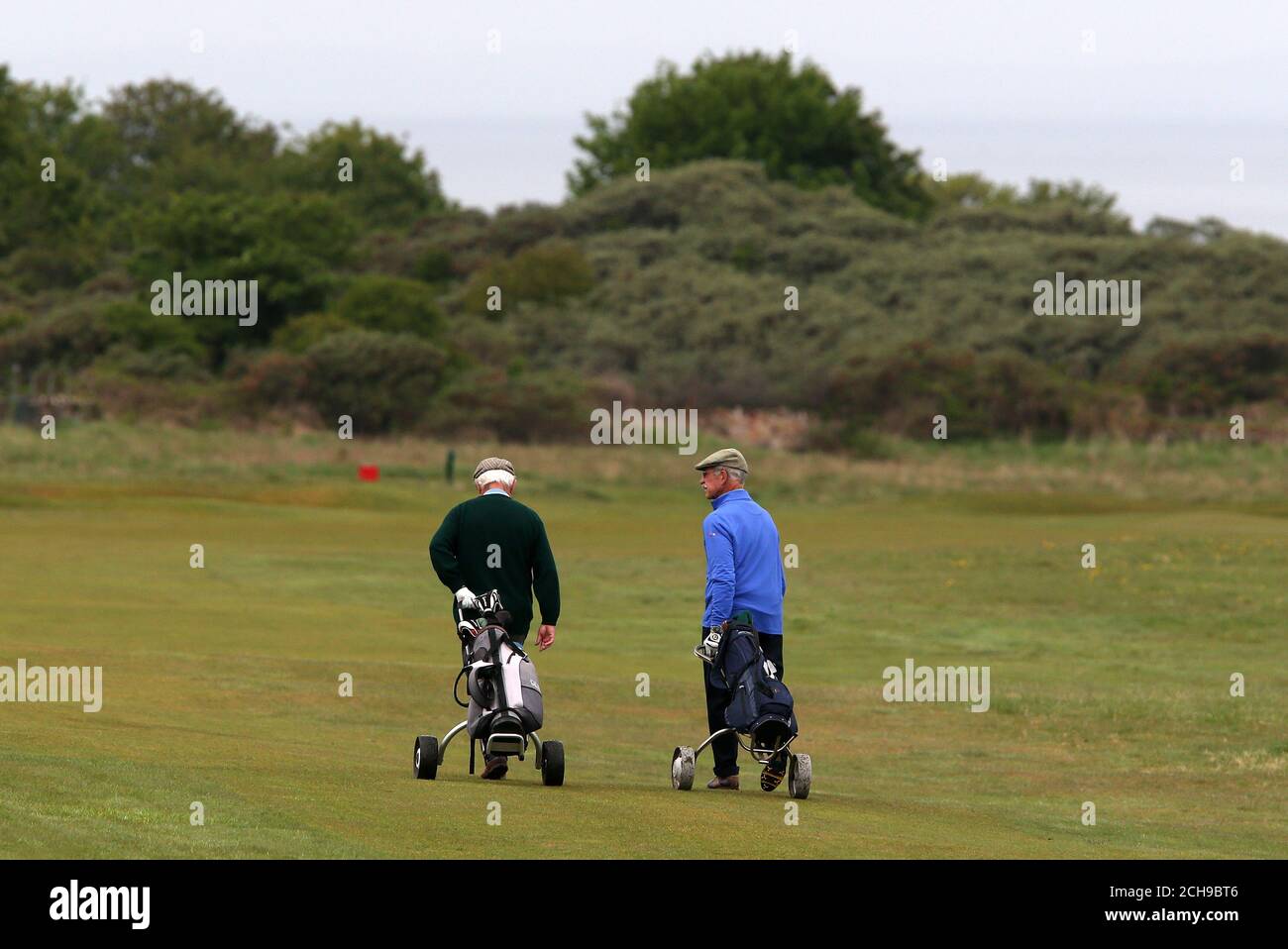 Visitors play golf at Muirfield Golf Club, East Lothian as the Captain of  Muirfield Golf Club Henry Fairweather makes an announcement on behalf of  The Honourable Company of Edinburgh Golfers regarding the