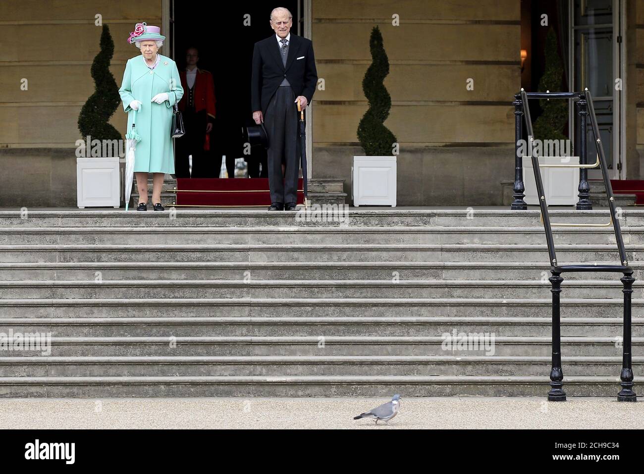 Queen Elizabeth II the Duke of Edinburgh attend a garden party at Buckingham Palace in London. Stock Photo