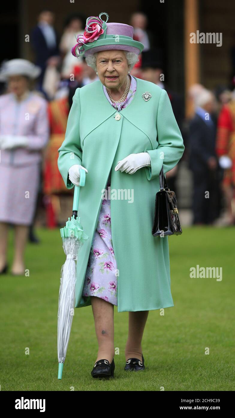 Queen Elizabeth II attends a garden party at Buckingham Palace in London. Stock Photo