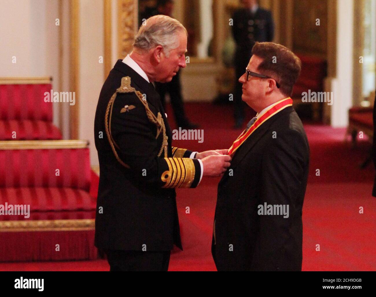 Sir Matthew Bourne from London is made a Knight Bachelor of the British Empire by the Prince of Wales at an investiture ceremony at Buckingham Palace, London. Stock Photo