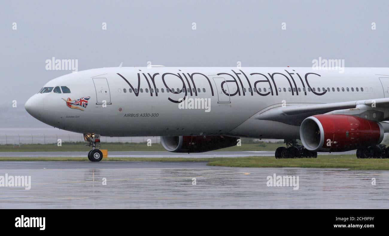 A Virgin Atlantic aircraft lands at Liverpool John Lennon Airport Stock Photo