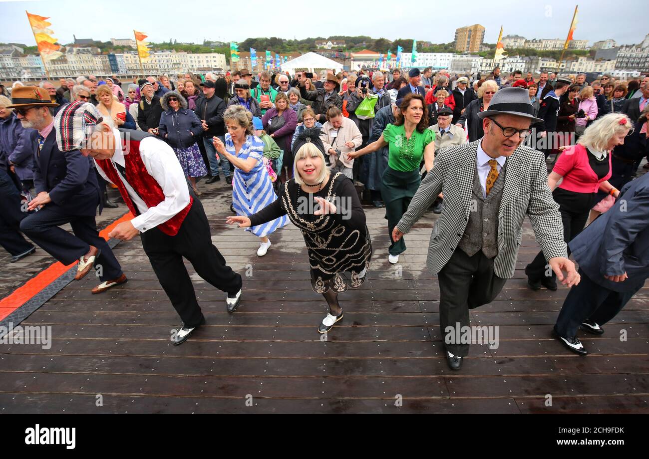 The Cinque Ports Lindy Hoppers vintage dance group perform during the Grand Opening Gala on Hastings Pier in East Sussex following two years of renovation works after it was closed for safety reasons in 2008 and virtually destroyed by the fire of October 2010. Stock Photo