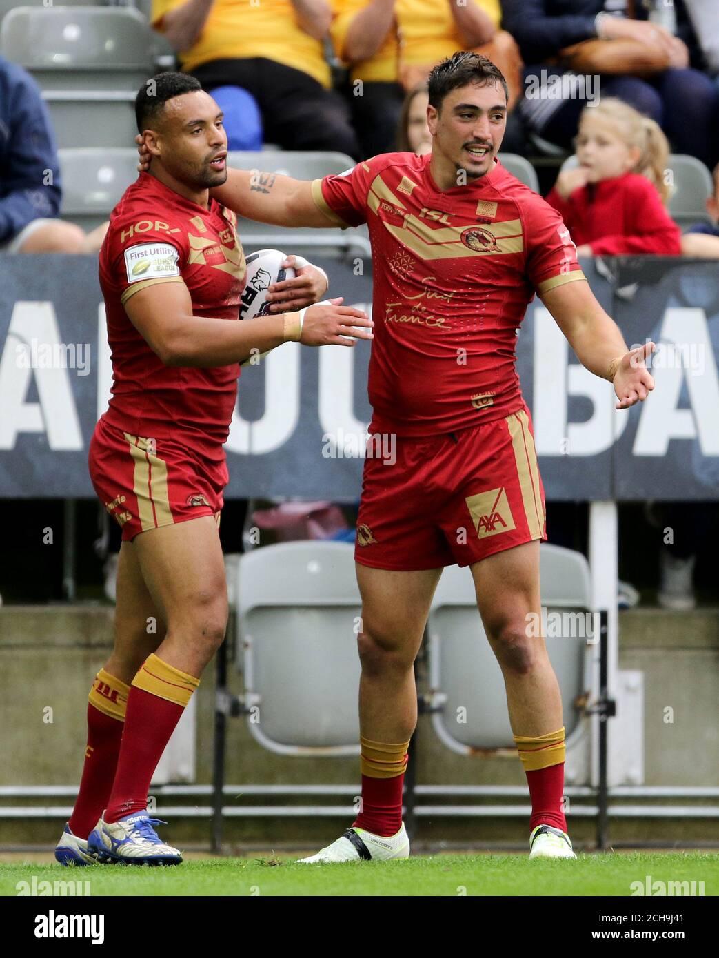 Catalan Dragons' Jodie Broughton (left) celebrates with Catalan Dragons' Tony Gigot during the Dacia Magic Weekend match at St James' Park, Newcastle. Stock Photo