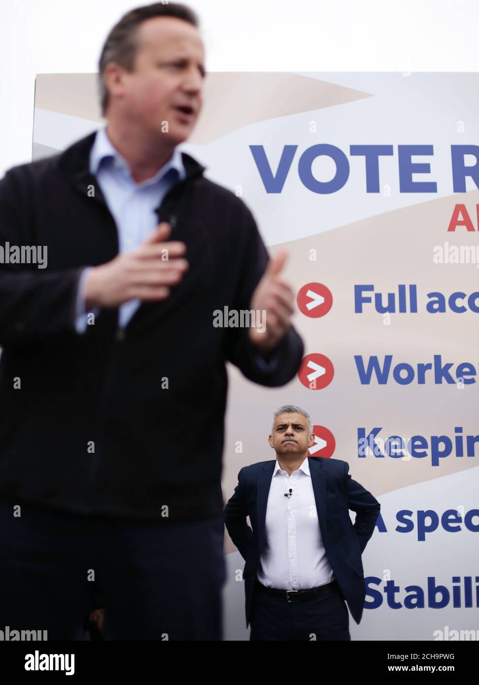 Prime Minister David Cameron speaking on stage as Mayor of London Sadiq  Khan looks on, during the launch of the Britain Stronger In Europe  guarantee card in West London, at Froebel College,