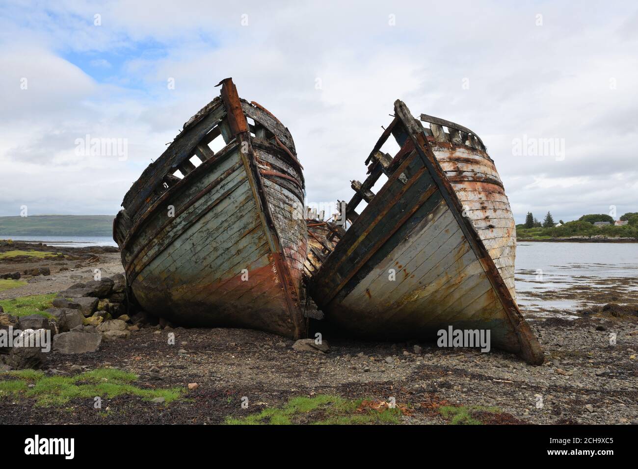 Two abandoned fishing boats lie beached at Salen on the Isle of Mull, Scotland, UK, Europe Stock Photo