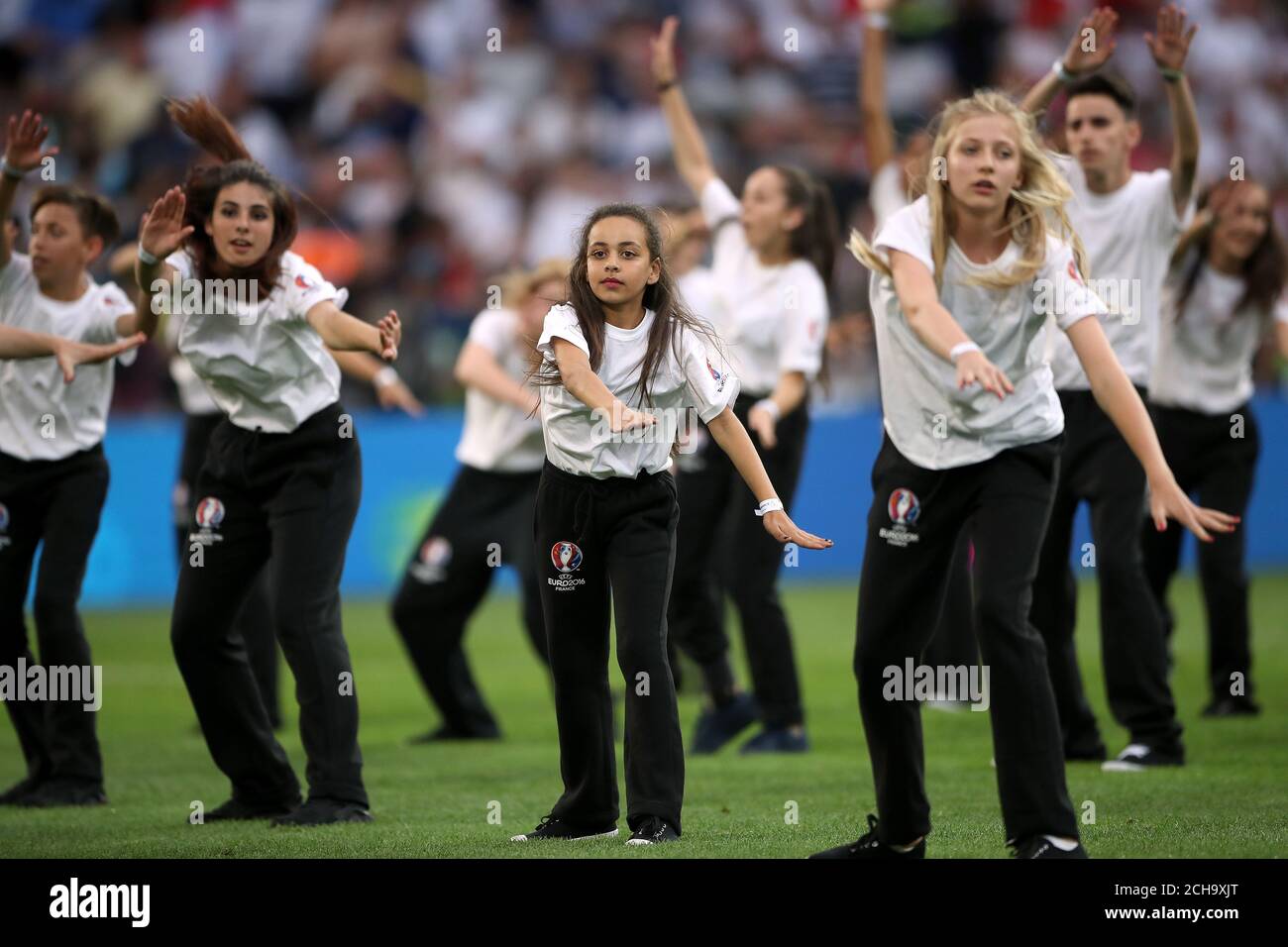 Dancers on the pitch before kickoff Stock Photo Alamy