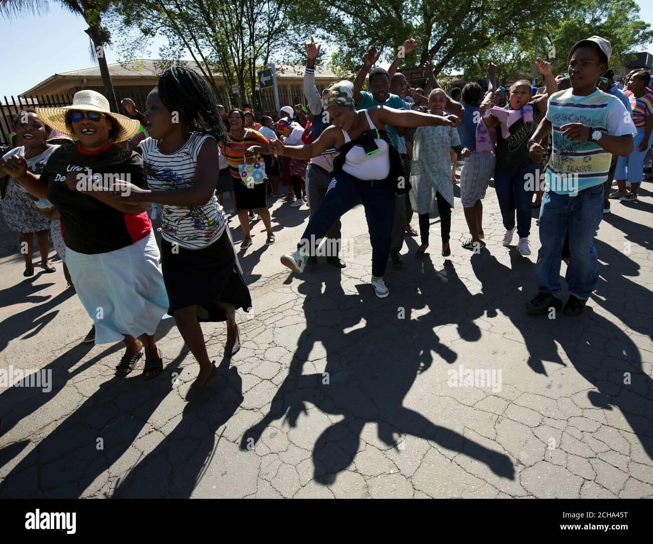 Community Members Protest Before Men Accused Of Cannibalism Arrive At 