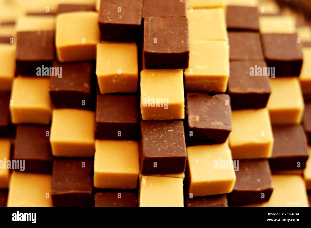 caramel candies - toffee pieces in cube shape Stock Photo - Alamy