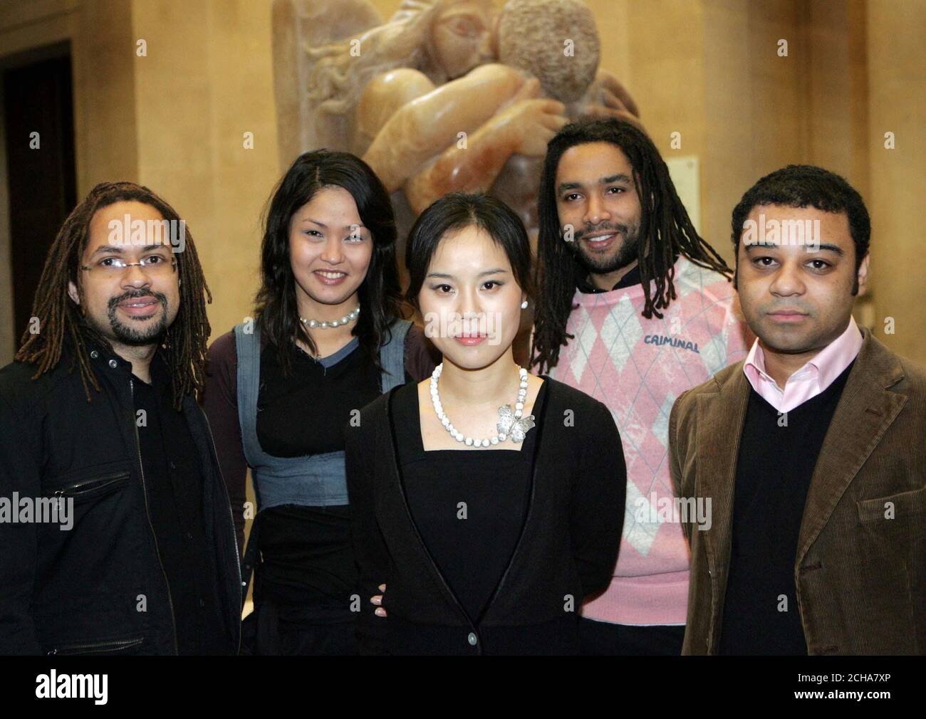 Picture shows the first five 'Fellows' selected by the Arts Council of England for their 'Inspire' scheme, designed to recruit more Black & Asian curators in britain's museums. (L-R) Jonah Albert, Ligaya Salzar, Gina Ha-Gorlin, Eddie Otchere and Cedar Lewisohn, from the Tate Britain, central London, Wednesday 7 December 2005. PRESS ASSOCIATION Photo. Photo credit should read: Mark Lees/PA Stock Photo