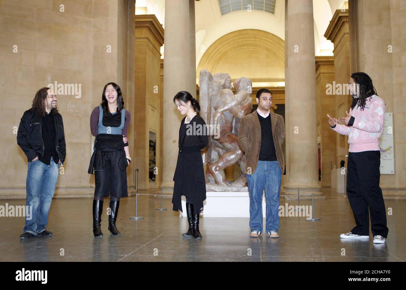 Picture shows the first five 'Fellows' selected by the Arts Council of England for their 'Inspire' scheme, designed to recruit more Black & Asian curators in britain's museums. (L-R) Jonah Albert, Ligaya Salzar, Gina Ha-Gorlin, Cedar Lewisohn and Eddie Otchere, from the Tate Britain, central London, Wednesday 7 December 2005. PRESS ASSOCIATION Photo. Photo credit should read: Mark Lees/PA Stock Photo