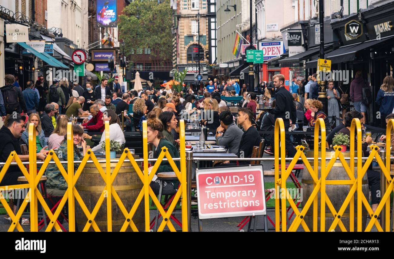 Restaurants in Soho London take their tables out for lunch al fresco in