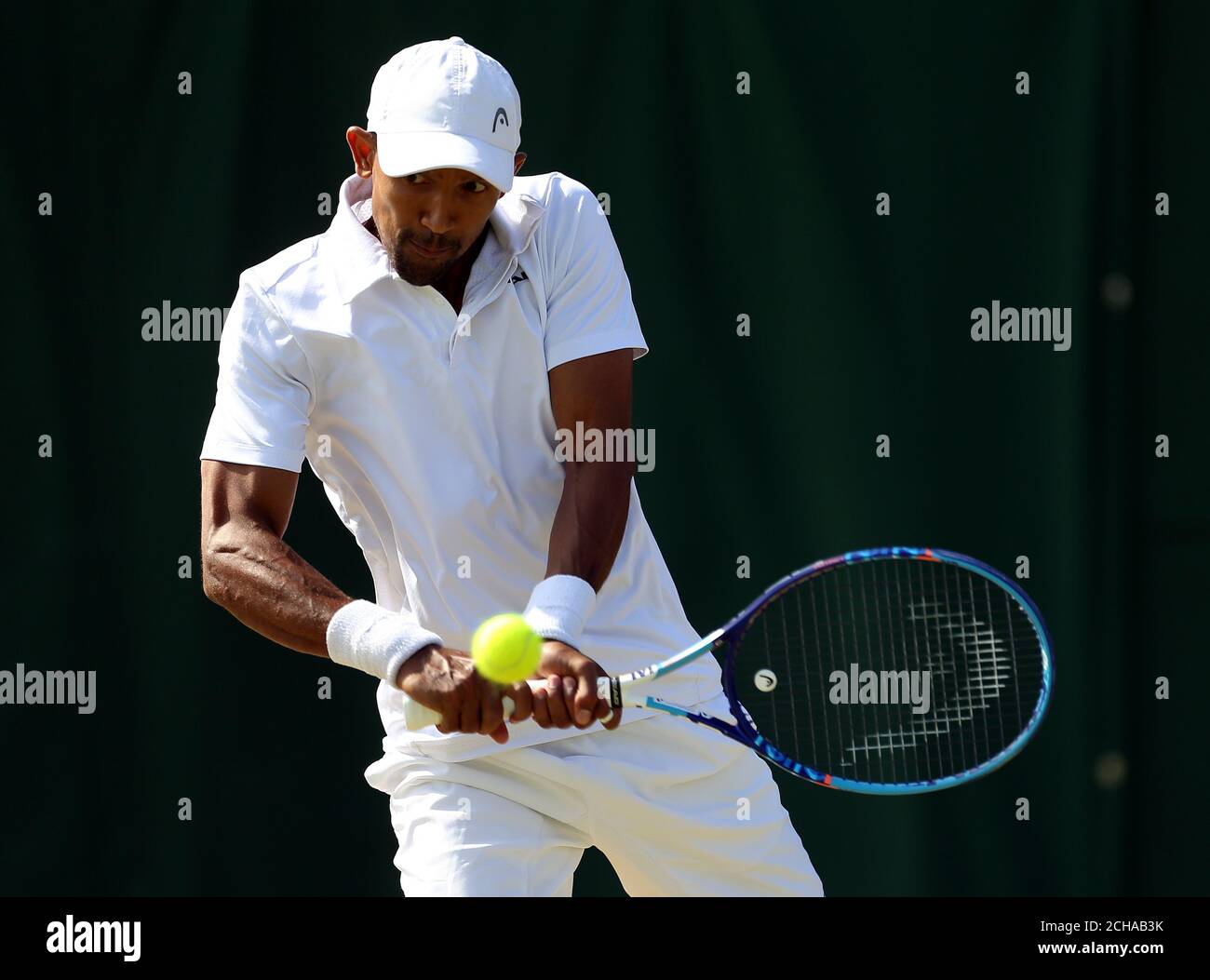 Raven Klaasen in action during his doubles match with Rajeev Ram on day  nine of the Wimbledon Championships at the All England Lawn Tennis and  Croquet Club, Wimbledon Stock Photo - Alamy