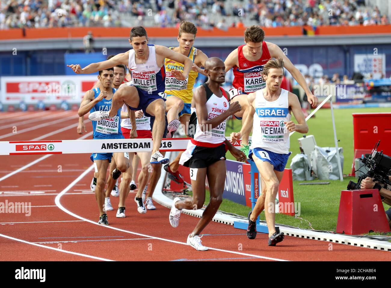 Great Britain's Rob Mullett (left) on his way to finishing fourth during the Men's 3000m Steeplechase Qualifying Round during day one of the 2016 European Athletic Championships at the Olympic Stadium, Amsterdam. Stock Photo