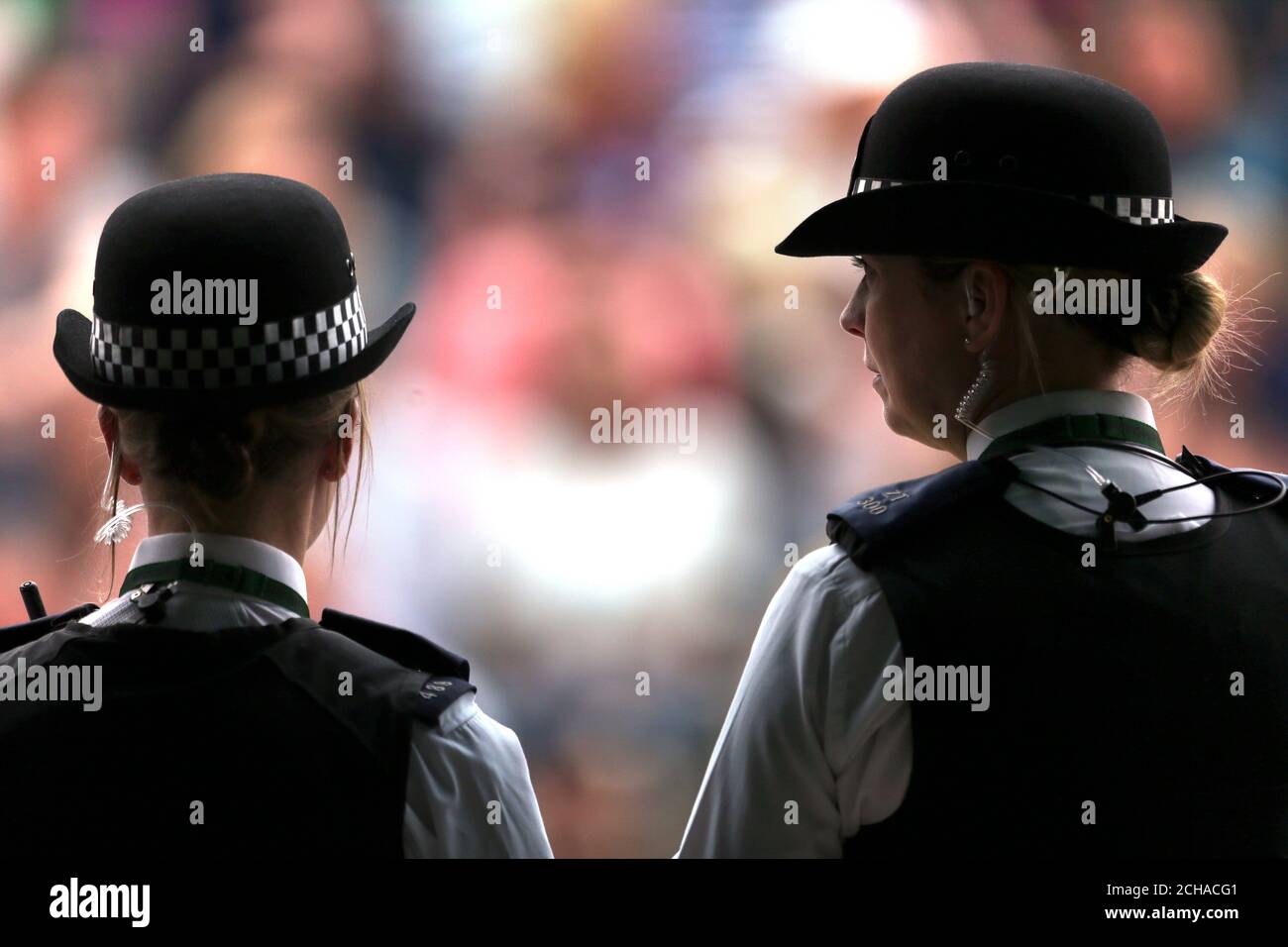 Security on Murray Mount as Andy Murray takes on Jo-Wilfried Tsonga on day nine of the Wimbledon Championships at the All England Lawn Tennis and Croquet Club, Wimbledon. Stock Photo