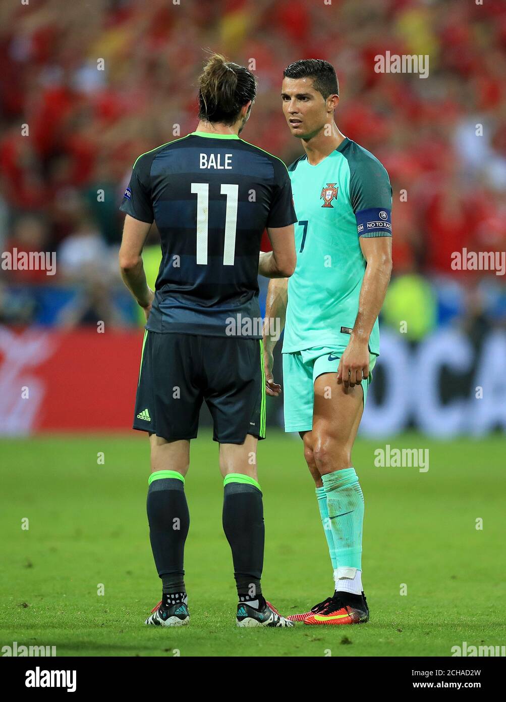 Wales' Gareth Bale (left) and Portugal's Cristiano Ronaldo talk following  the UEFA Euro 2016, semi-final match at the Stade de Lyon, Lyon Stock Photo  - Alamy, image size:1003x1390