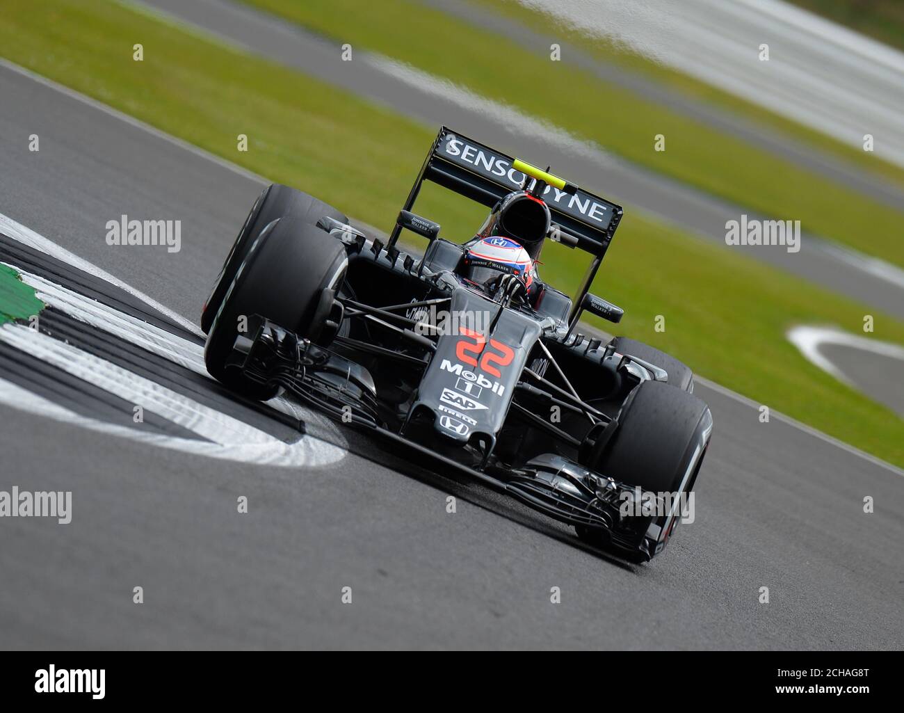 McLaren's Jenson Button during Practice Day for the 2016 British Grand Prix at Silverstone Circuit, Towcester. PRESS ASSOCIATION Photo. Picture date: Friday July 8, 2016. See PA story AUTO British. Photo credit should read: Tony Marshall/PA Wire. RESTRICTIONS: Editorial use only. Commercial use with prior consent from teams. Call +44 (0)1158 447447 for further information. Stock Photo