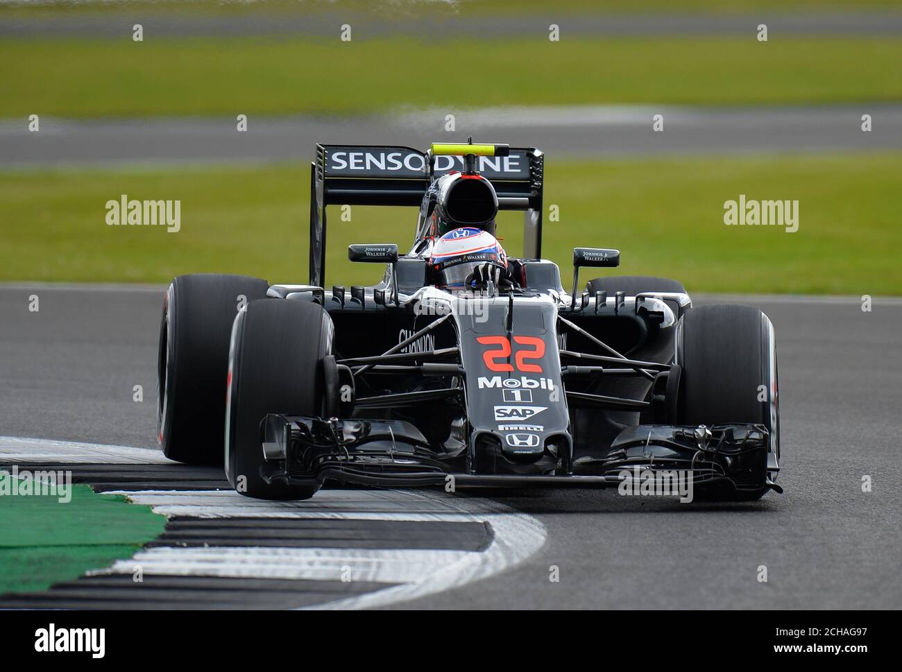 McLaren's Jenson Button during Practice Day for the 2016 British Grand Prix at Silverstone Circuit, Towcester. PRESS ASSOCIATION Photo. Picture date: Friday July 8, 2016. See PA story AUTO British. Photo credit should read: Tony Marshall/PA Wire. RESTRICTIONS: Editorial use only. Commercial use with prior consent from teams. Call +44 (0)1158 447447 for further information. Stock Photo