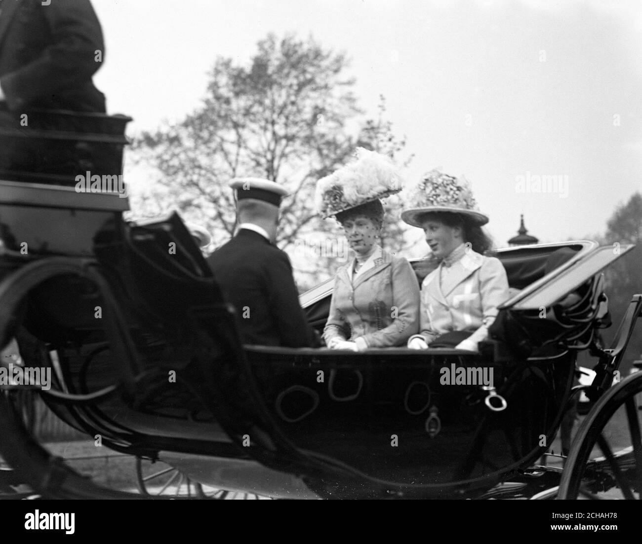 Queen Mary alongside Princess Mary as they leave Buckingham Palace. Stock Photo