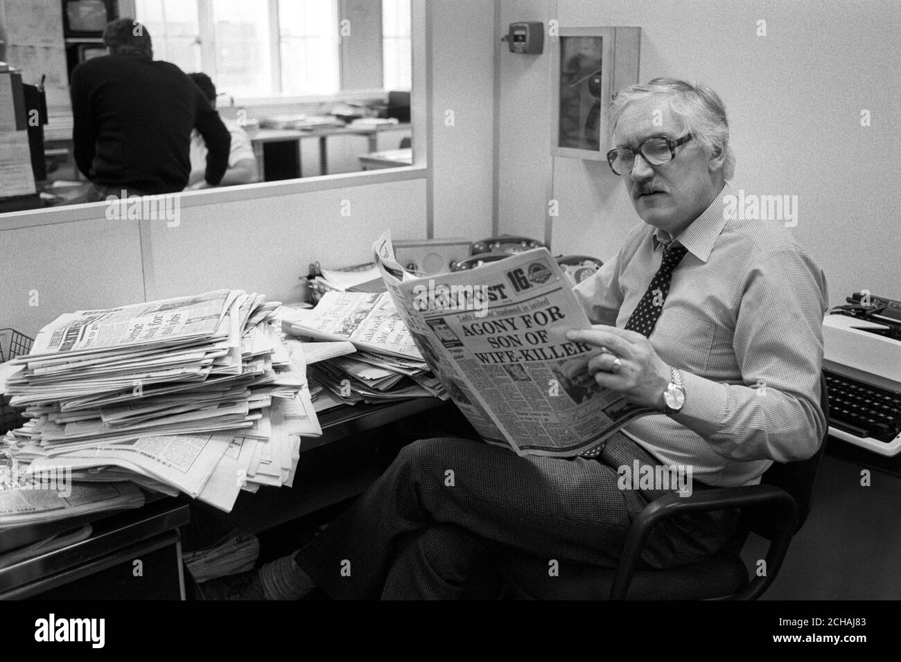 Associate editor Black and White Stock Photos & Images - Alamy