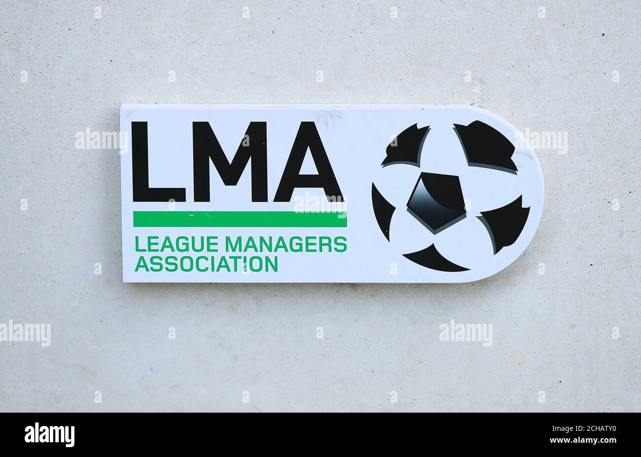 A view of the League Managers Association logo on a wall at St George's Park, Burton. Stock Photo