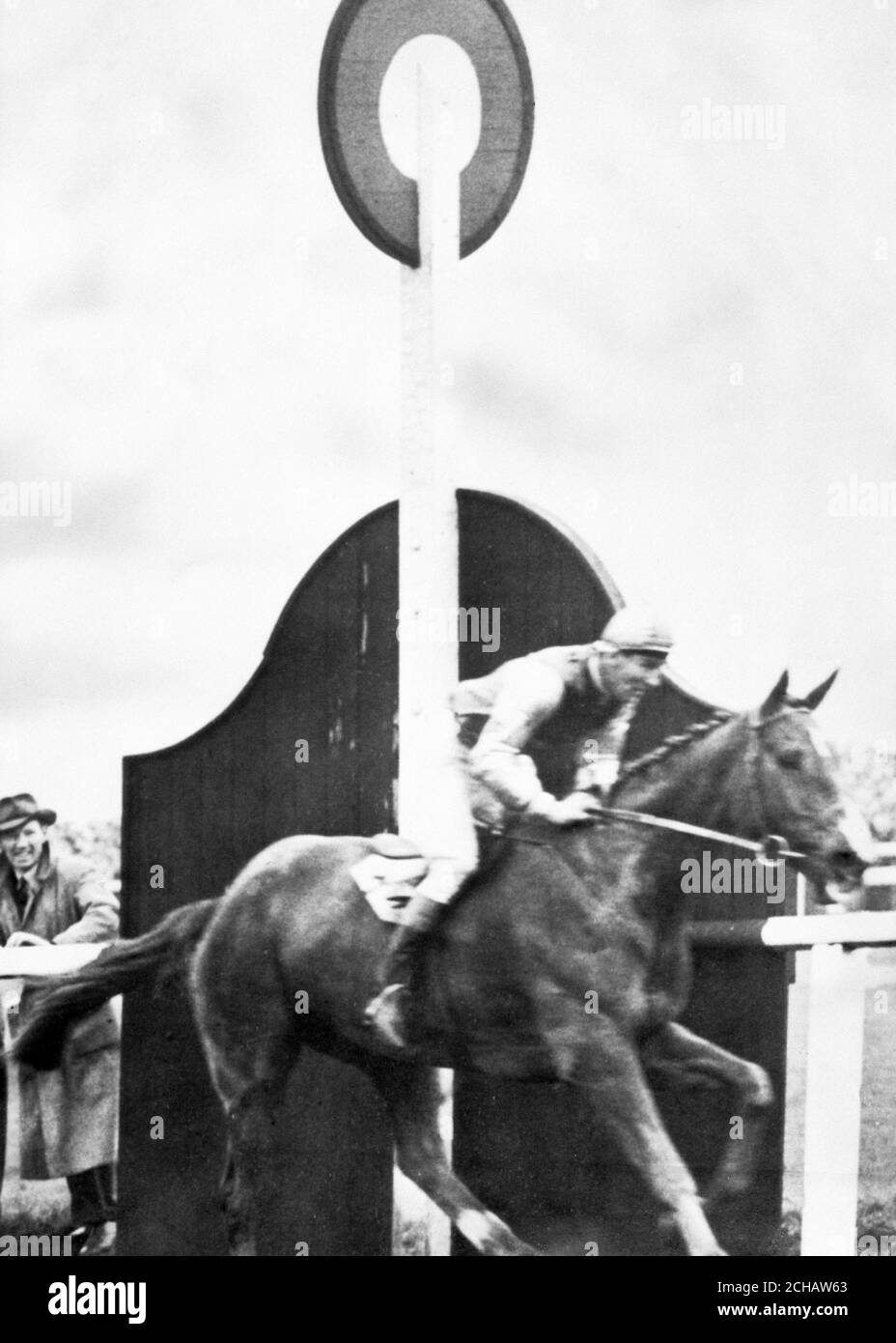J. H. Griffin's Early Mist, ridden by Bryan Marshall, passing the post to win the Grand National at Aintree. Stock Photo