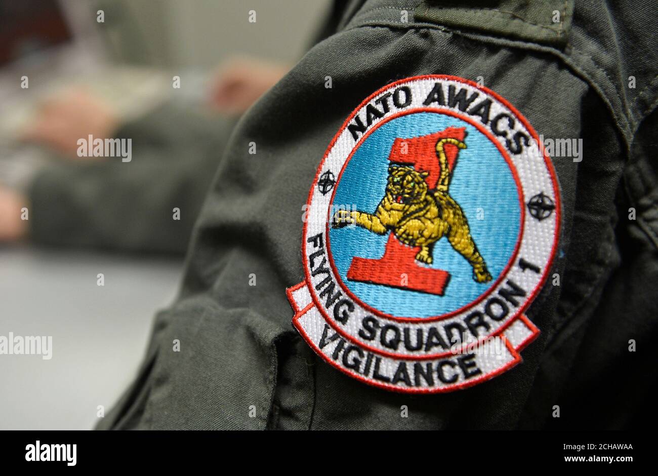 A view of a uniform patch of a NATO soldier inside the Boeing AWACS  reconnaissance plane during a ceremony over the signing of a contract  between NATO and Boeing, on upgrades to