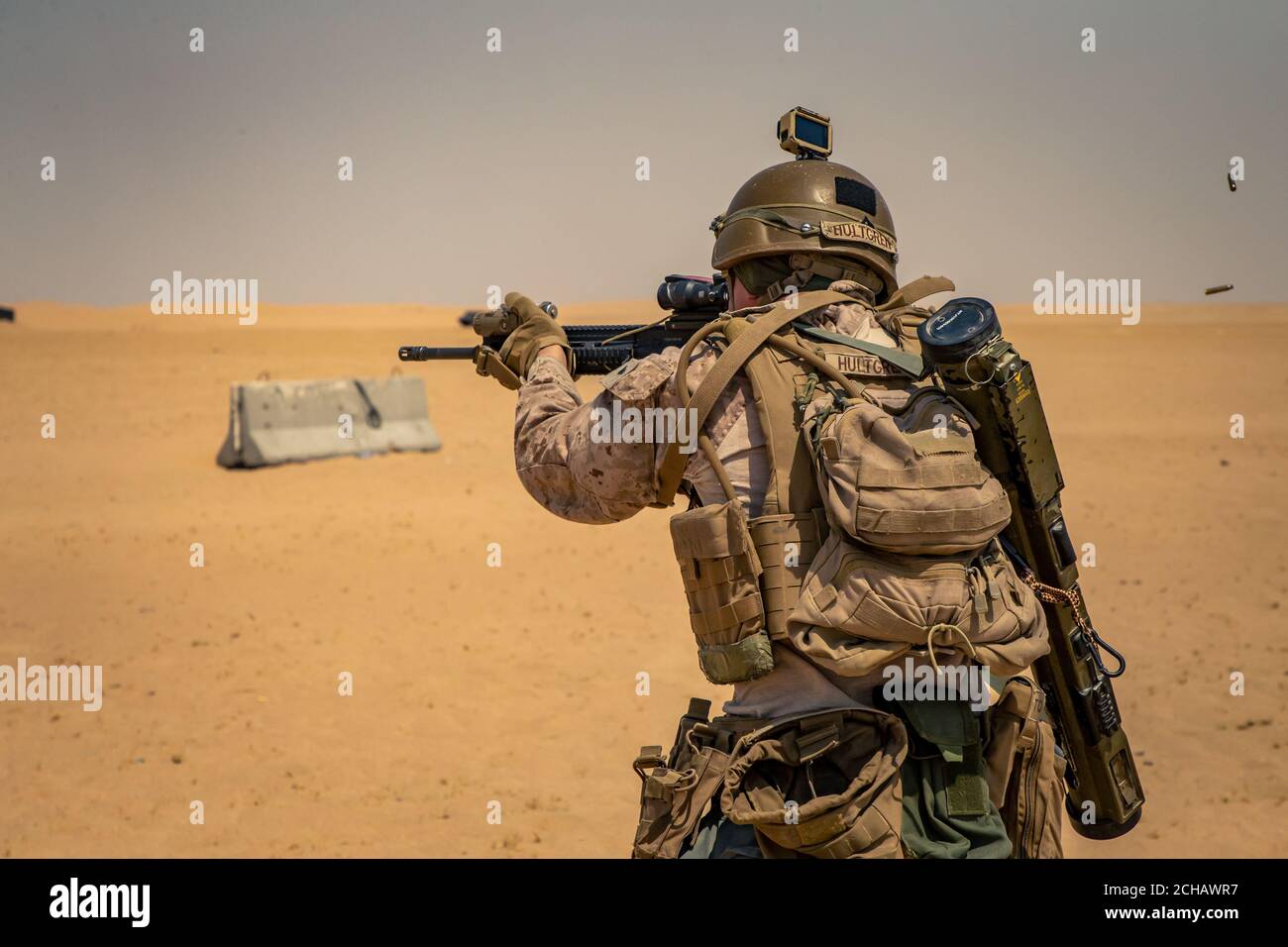 A U.S. Marine with 2nd Battalion, 5th Marine Regiment, with Special Purpose Marine Air-Ground Task Force Crisis Response - Central Command 20.2, engages targets with his M27 infantry automatic rifles during an anti-armor range in Kuwait, Sept. 3, 2020. The training focused on integrating anti-armor capabilities at the platoon level. The SPMAGTF-CR-CC is a crisis response force, prepared to deploy a variety of capabilities across the region. (U.S. Marine Corps photo by Lance Cpl. Andrew Skiver) Stock Photo
