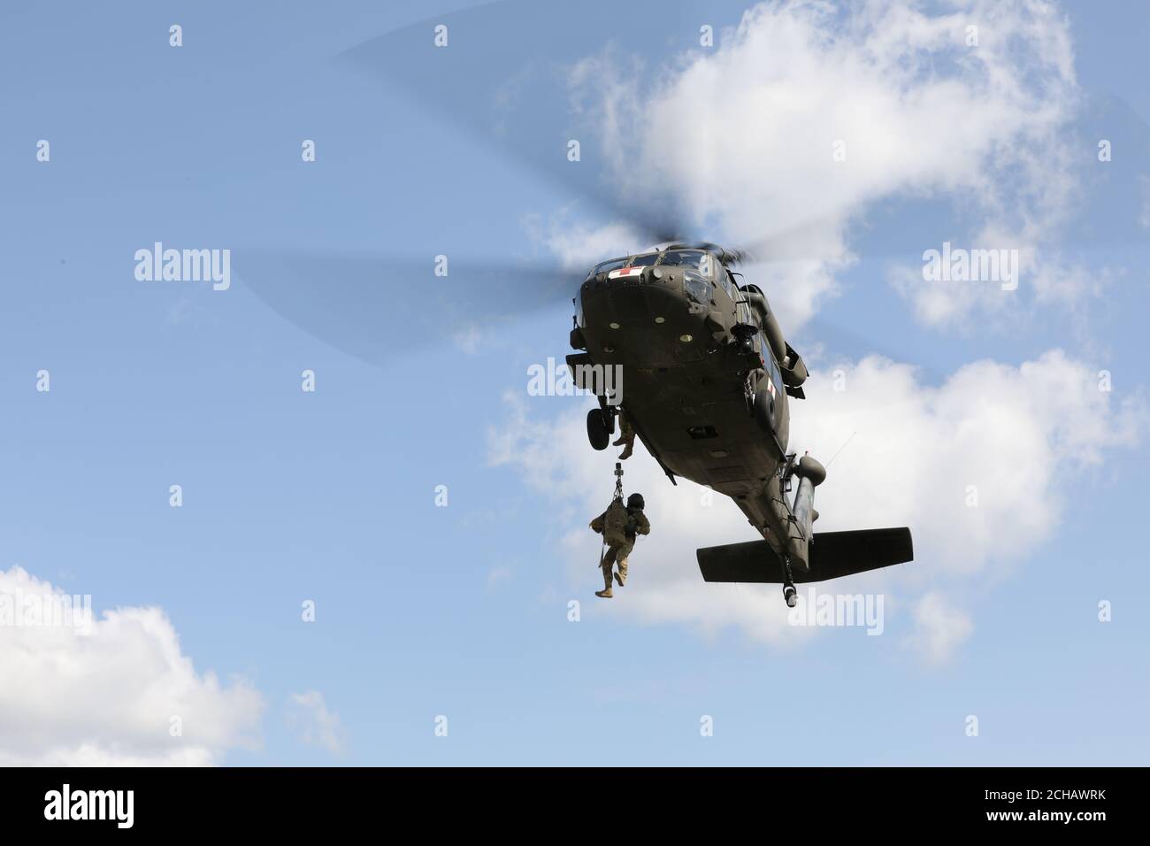 Sgt. Joe Harris, a flight medic in progression assigned to the 1-168th ...
