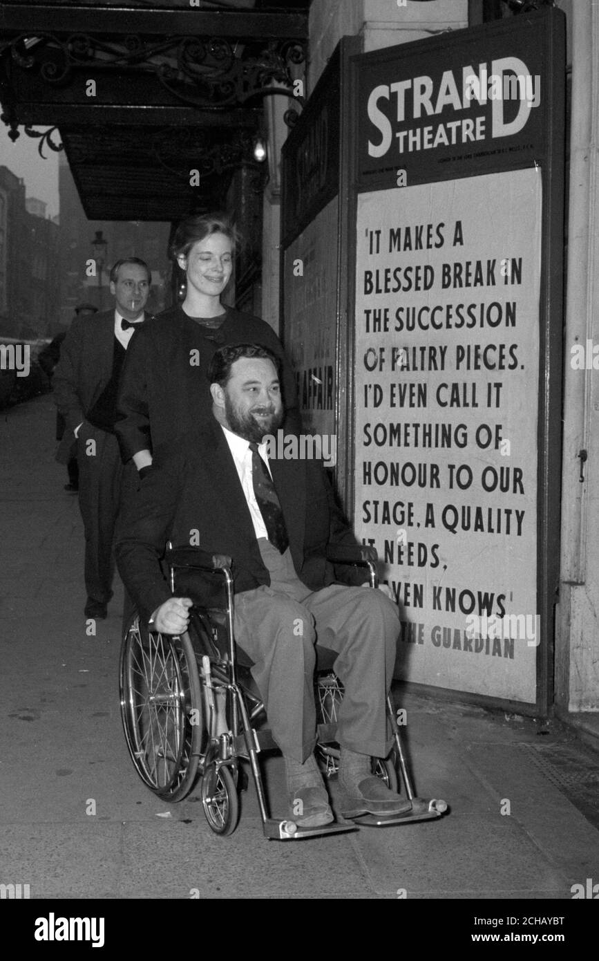 Bearded actor Michael Flanders (a polio victim) arrives in his wheelchair for a meeting of Equity, the actor's union, at the Strand Theatre, London. The union is involved in a pay dispute with the Independent television companies, against whom it has taken strike action. Stock Photo