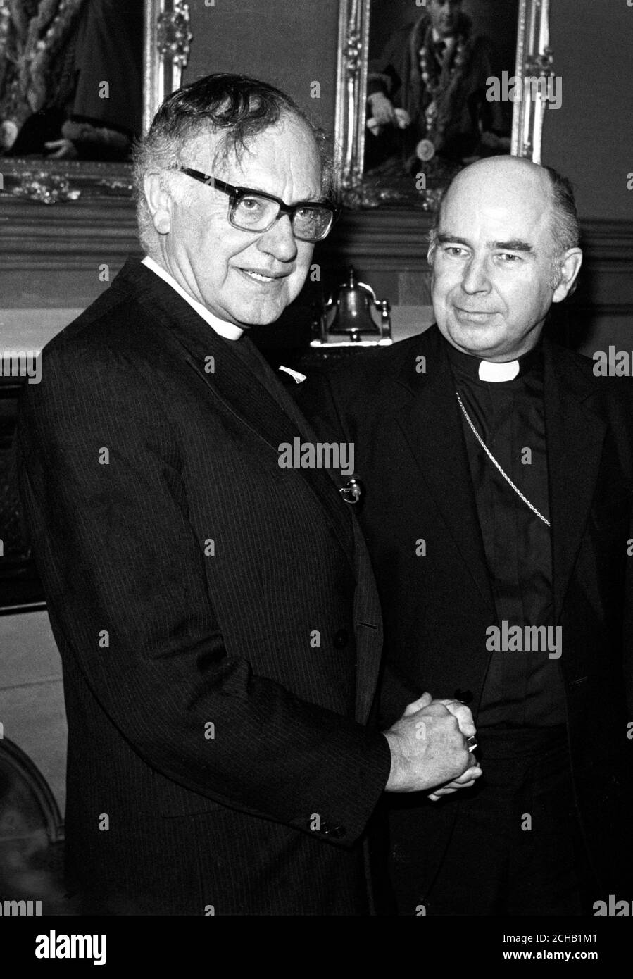 (L-R) Dr Robert Runcie, Archbishop of Canterbury, shaking the hand of Edward Daly, Roman Catholic Archbishop of Derry, during a meeting in Londonderry. Stock Photo
