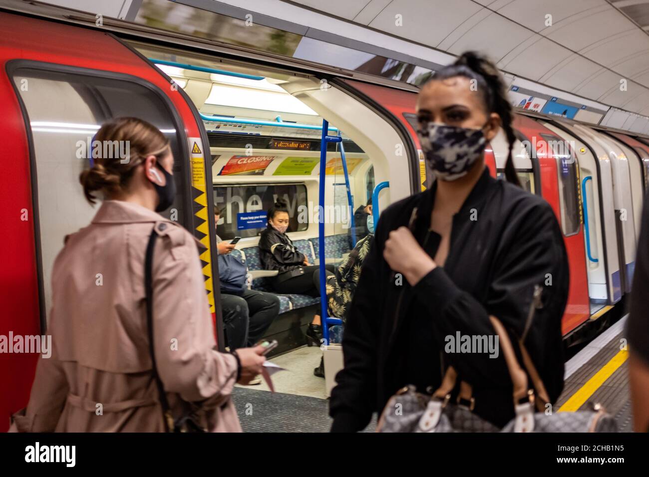 London- September, 2020: People in the London Underground wearing covid 19 face masks Stock Photo