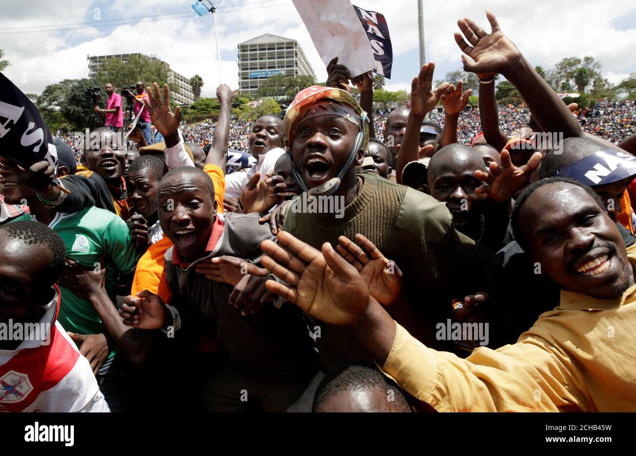 Supporters of Kenyan opposition National Super Alliance (NASA) coalition cheer at a rally endorsing Raila Odinga as the presidential candidate for the 2017 general elections at the Uhuru Park grounds, in Nairobi, Kenya, April 27, 2017. REUTERS/Thomas Mukoya     TPX IMAGES OF THE DAY Stock Photo
