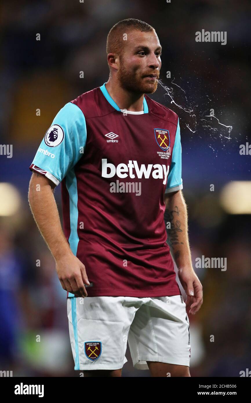 Football top half stock spit hi-res stock photography and images - Alamy