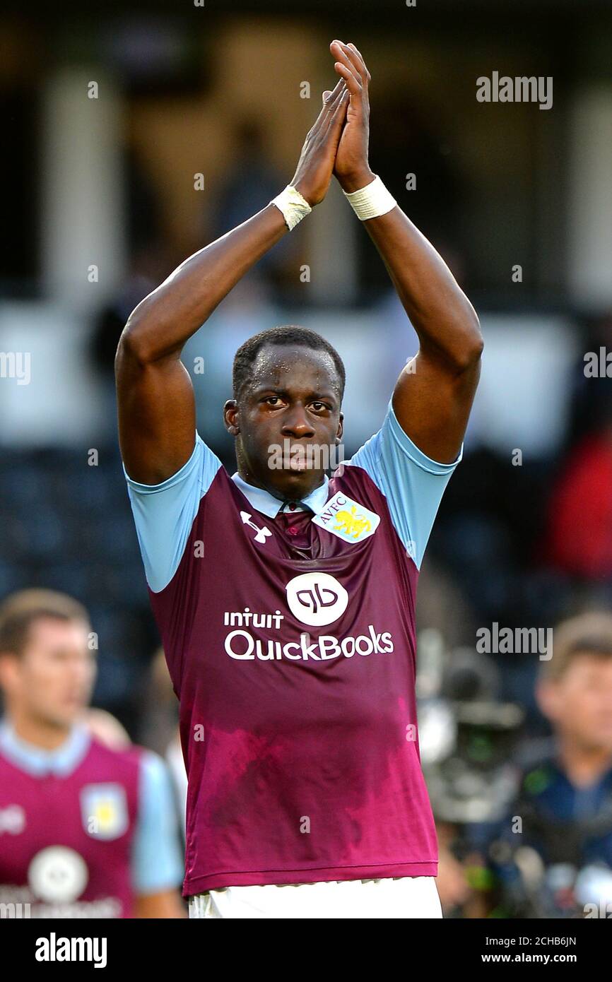 Aston Villa's Aly Cissokho acknowledges the travelling support Stock Photo