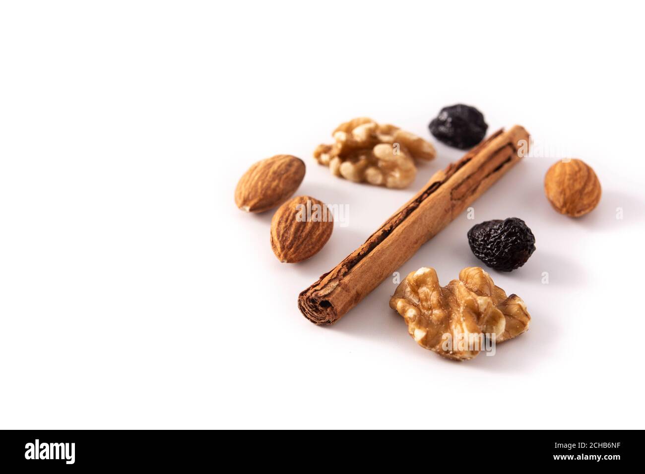 Assortment of nuts and cinnamon isolated on white background Stock Photo
